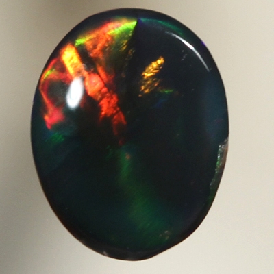 SOLID BLACK OPAL Bright cherry red in a Broad rolling flash